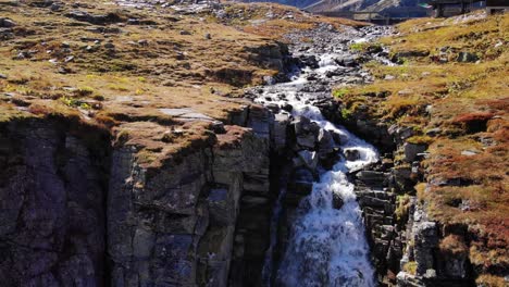 Waterfall-Flowing-Down-The-Rugged-Cliff-In-High-Tauern-National-Park-In-Austria