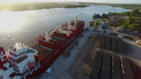 Busy-Workers-At-The-Port-Of-Buenos-Aires-In-Argentina-With-Bulk-Cargo-Ship-Docked-For-Loading-Of-Logs