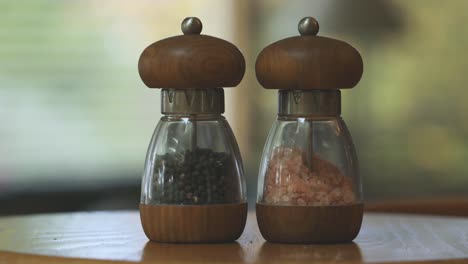Black-pepper-and-pink-himalayan-salt-in-spice-jars