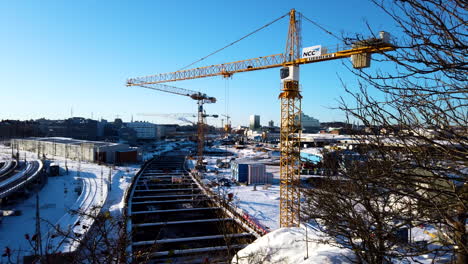 Cranes-working-at-West-Link-construction-in-sunny-winter-day