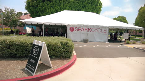 People-On-Outdoor-Cycling-Classes-At-Spark-Cycle-In-Point-Loma,-San-Diego,-California-During-Pandemic