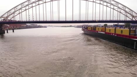 Bolero-Cargo-Ship-Passing-Under-Bridge-Over-The-Noord-In-Hendrik-Ido-Ambacht