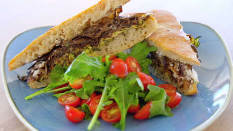 Delicious-Ciabatta-Sandwich-Bread,-Grilled-Eggplants,-Zucchini-And-Cherry-Tomatoes-On-Plate