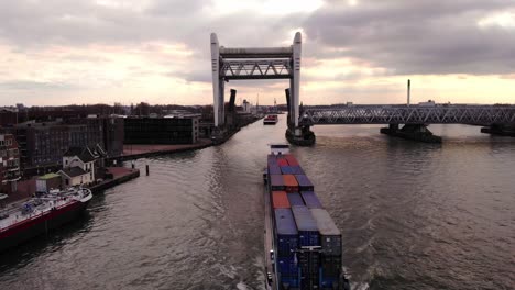 Alphenaar-Cargo-Ship-Slowly-Leaving-Raised-Spoorbrug-Railway-Bridge