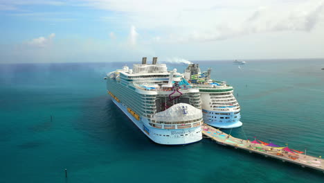 Rotating-drone-shot-of-two-the-Wonder-of-The-Seas,-Royal-Caribbean-cruise-ship