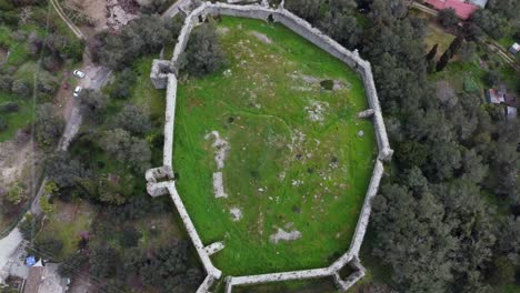 Gorgeous-aerial-view-flight-drone-camera-pointing-down-footage-castle-ruins-of-a-byzantine-fortress-of-13th-century-wild-nature-Corfu-Greece-4k-Cinematic-view-from-above-by-Philipp-Marnitz-spring-2022