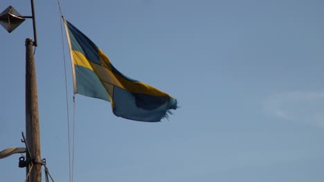 National-flag-of-Sweden-waving-in-the-wind,-Swedish