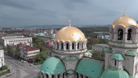 Drone-shot-circling-around-Alexander-Nevsky-cathedral-in-Sofia,-Bulgaria