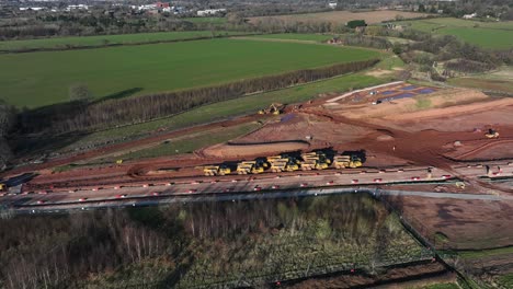 Timelapse,-Heavy-Plant-Machinery-Working-On-High-Speed-Railway-Construction-Coventry-Aerial-View-Winter-HS2-UK