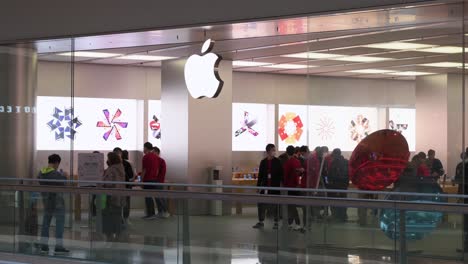 Multinational-American-technology-brand-official-Apple-store-and-logo-at-a-shopping-mall-in-Hong-Kong