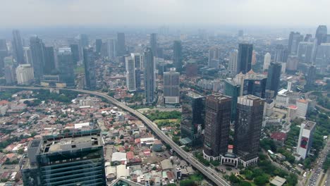 Jalan-Jenderal-Sudirman-street-crossing-Jakarta-city-center,-Indonesia
