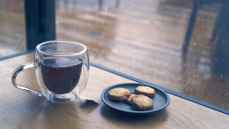 Tea-and-cookies-in-the-warm-room-on-a-rainy-day