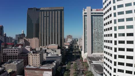 Wide-aerial-shot-flying-over-Canal-Street-in-downtown-New-Orleans