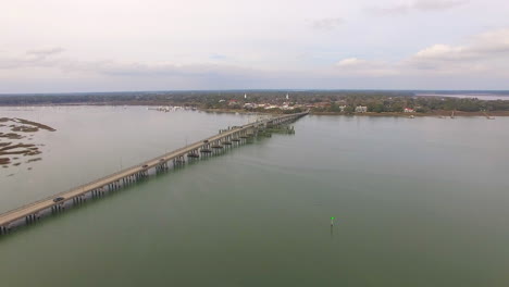 Aerial-shot-of-cars-driving-over-The-Richard-V-Woods-Memorial-Swing-Bridge-toward-Beaufort-SC-from-Lady's-Island-over-the-ICW-river