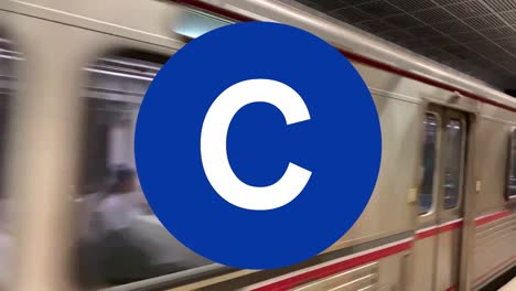 Train-passing-by-with-subway-line-graphics
