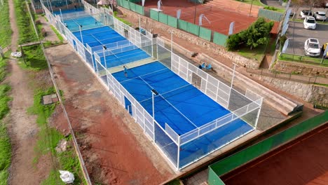 Aerial-static-view-of-people-playing-paddle-in-outdoors-padel-curt