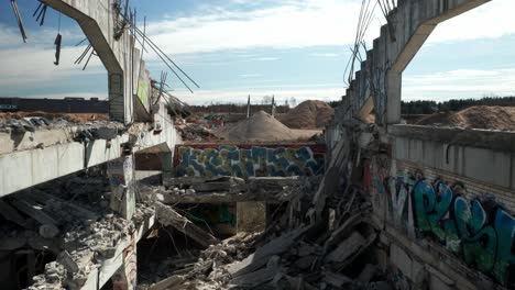 AERIAL:-Metal-Bars-and-Graffiti-on-Demolsihed-Wall-of-Lithuania-National-Stadium