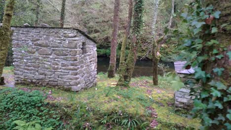 Cabin-oven-mountain-shelter-built-with-stones-near-the-Sor-river-with-forest-and-oaks
