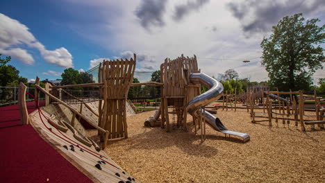 Wooden-Playground-Equipment-And-Structures-In-A-Public-Park-On-Summer-Day