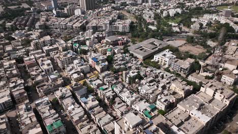 Aerial-shot-of-Karachi-city-surrounded-by-houses-and-street