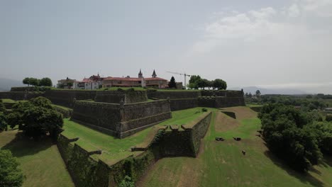 Aerial-view-of-ancient-fortress-walls-and-village-of-Valença-do-Minho-on-sunny-day