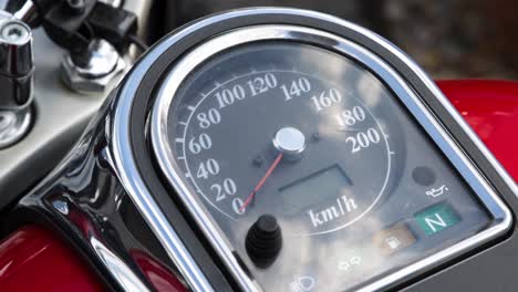 Motorbike-Speedometer-Closeup-Vintage-Bike-Odometer-Slow-Motion-Scooter-Clock-Mileage-Indicator-Classic-Vehicle-Milo-Meter-Red-and-Black-Km-Silver-Steel-Handlebars-Motor-Cycle