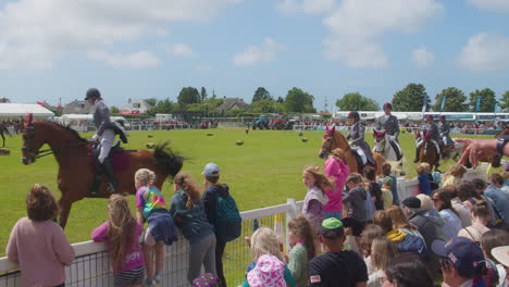 Royal-Cornwall-Show-2022-with-Iberian-Horses-from-Americas-Galloping-Parades-Around-a-Field-with-a-Crowd-Watching-them-Pass