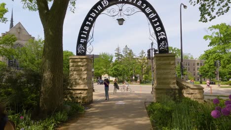 Student-Walks-through-The-Arch-at-Northwestern-University-on-Summer-Day