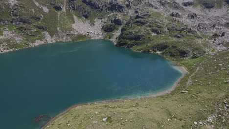 Drone-footage-of-one-of-the-Fontargente's-lakes-in-the-Pyrenees-mountains