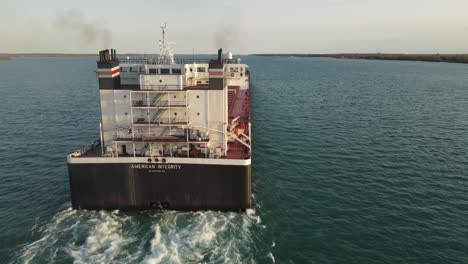 Aerial-close-up-shot-of-a-Huge-Freighter-on-Detroit-River-near-Wyandotte-Michigan