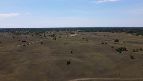 Aerial-dolly-forward-flying-over-sand-dunes-of-Fulophaza,-Hungary