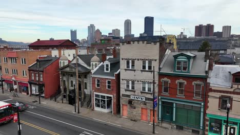 Aerial-rising-shot-of-historic-street-in-Pittsburgh-South-Side