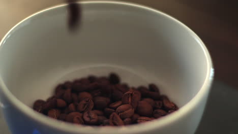 Pouring-Coffee-Beans-Into-a-bowl