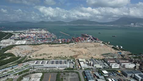 Aerial-drone-view-of-landfill-and-Cargo-Pier-in-Tuen-Mun,-Hong-Kong