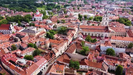 Narrow-streets-and-colorful-rooftops-of-Vilnius-old-town,-aerial-view
