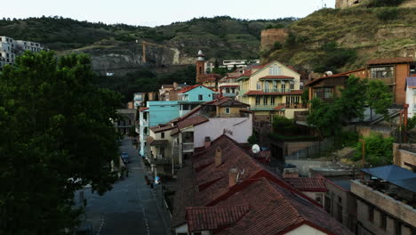 Fly-Over-Typical-Architecture-In-The-Old-Town-Of-Tbilisi-During-Sunrise-In-Georgia