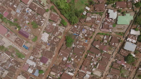 Wide-top-down-aerial-footage-of-blocks-of-neighborhoods-in-Freetown,-Sierra-Leone