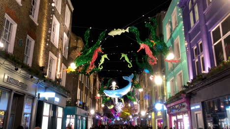 Outdoors-view-of-the-Carnaby-Christmas-installation,-a-collaboration-between-Shaftesbury-and-ocean-conversation-charity-Project-O-about-the-environment-and-the-urgency-to-save-the-planet