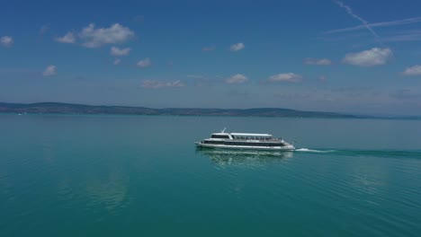Tourist-ship-in-the-summer-on-the-lake-Balaton,-drone-footage