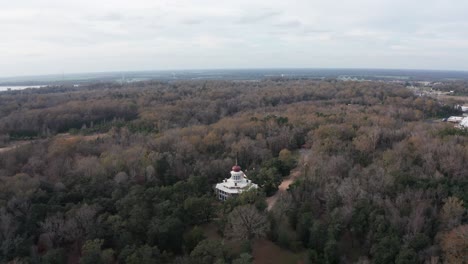 Aerial-wide-reverse-pullback-shot-of-the-historic-antebellum-octagonal-mansion-Longwood-in-Natchez,-Mississippi