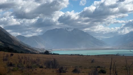 Stunning-mountains-near-Lake-Ohau,-NZ-with-sweeping-views-of-Southern-Alps,-rugged-terrain-and-crystal-clear-waters