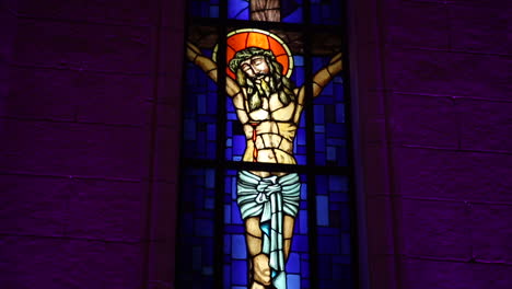 Decorative-painting-of-Christ-on-the-church-wall---camera-tilt-up