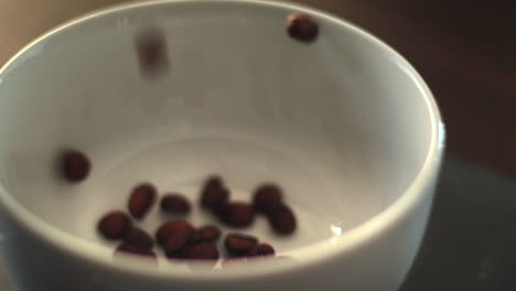 Pouring-Coffee-Beans-Into-a-bowl