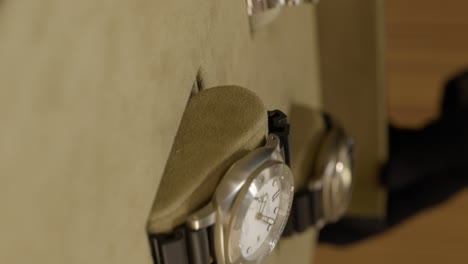 Vertical-Panning-Reveal-Of-Timeless-Elegant-Collection-Of-Luxury-Watches-Displayed-At-Panerai-Boutique