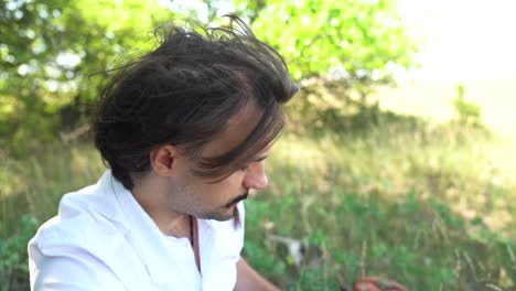 Hungarian-poet-Sandor-Petofi-eating-snack,-resting-in-shade