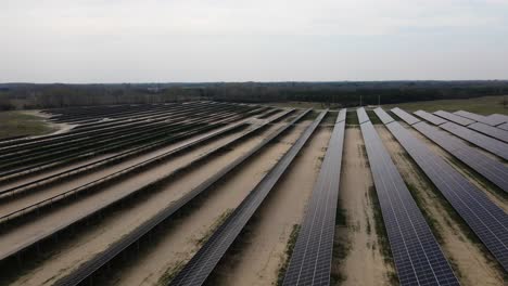 Drone-flying-above-large-solar-farm-in-Hungarian-countryside