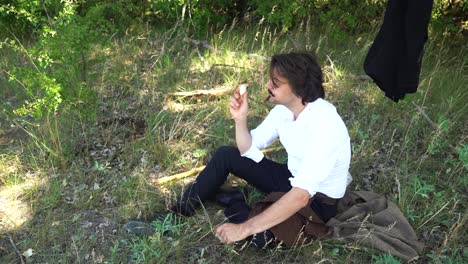 Hungarian-poet-Sandor-Petofi-resting-in-shady-field-enjoying-snack