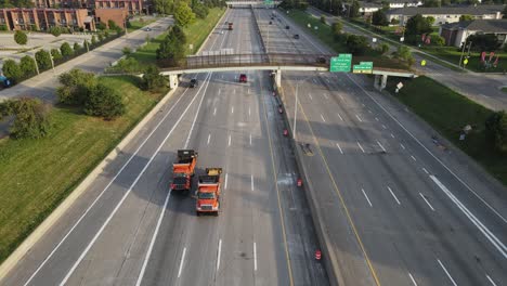 Static-shot-of-175-freeway-in-Detroit,-construction-vehicles-blocking-lanes-for-working-safe-on-the-road