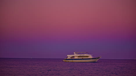 Boat-Trip-On-The-Red-Sea-In-Egypt-Against-Colorful-Evening-Sky