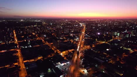 Flyover-city-of-Temuco-during-scenic-sunset-lights-in-Chile